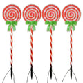Set of 4 lollipop candy stripe Christmas pathway lights with green bows