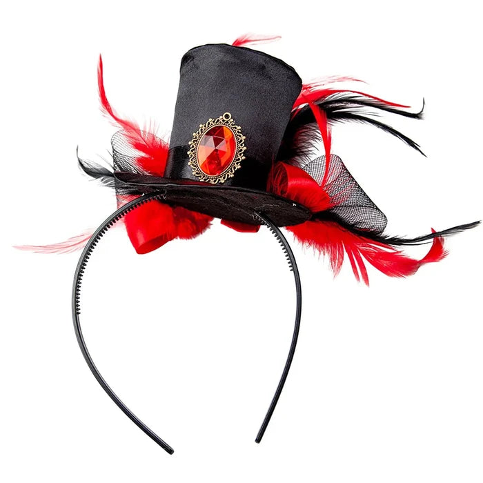 Mini top hat on headband with red and black feathers, ribbons and a large red gemstone