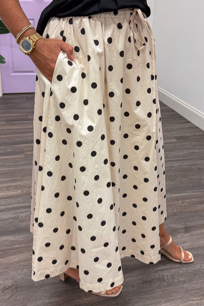 cream with black polka dot print elastic waist cotton poplin midi skirt with side pockets