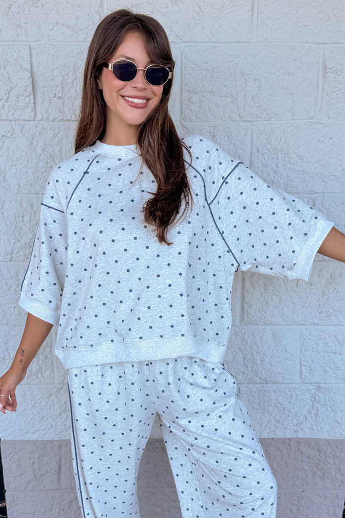 washed heather grey with navy polka dot print short sleeve terry knit top