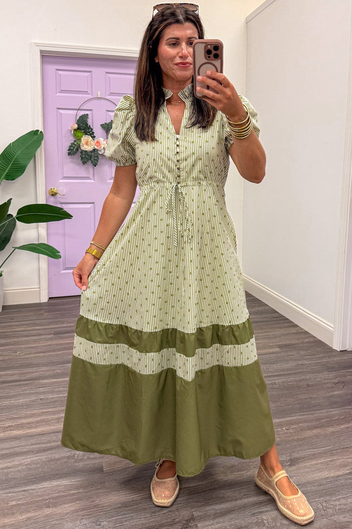 cream and olive green striped and polka dot print v neckline cinch waist midi dress