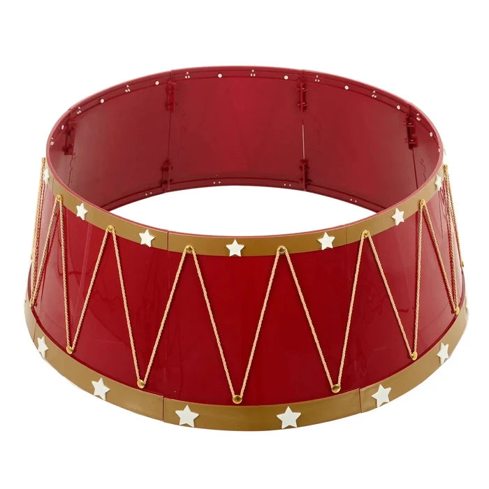 Red and gold drum style Christmas tree skirt with white stars and gold cord