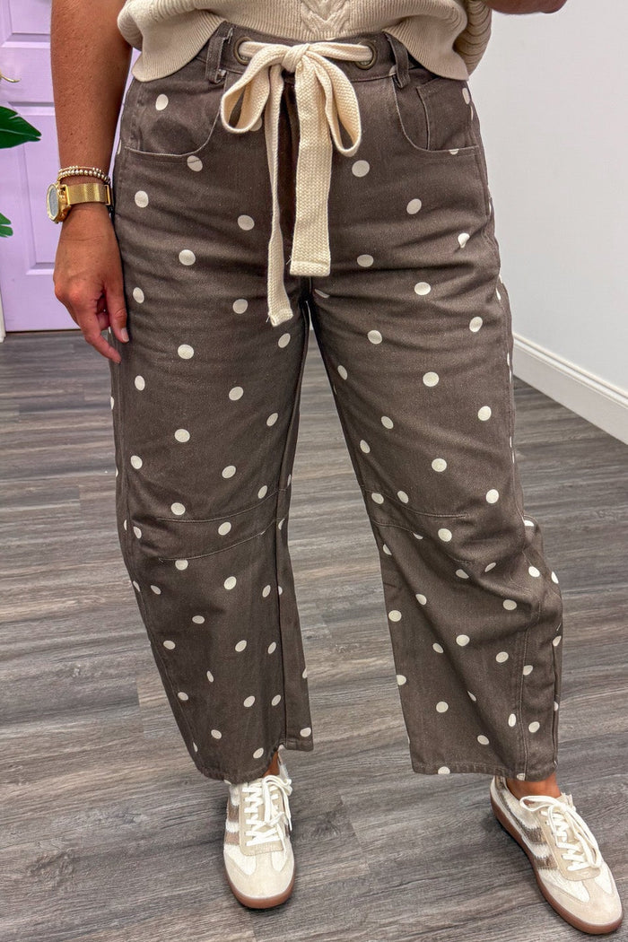 washed brown with ivory polka dot print wide barrel leg denim pants with button/zipper and drawstring closure