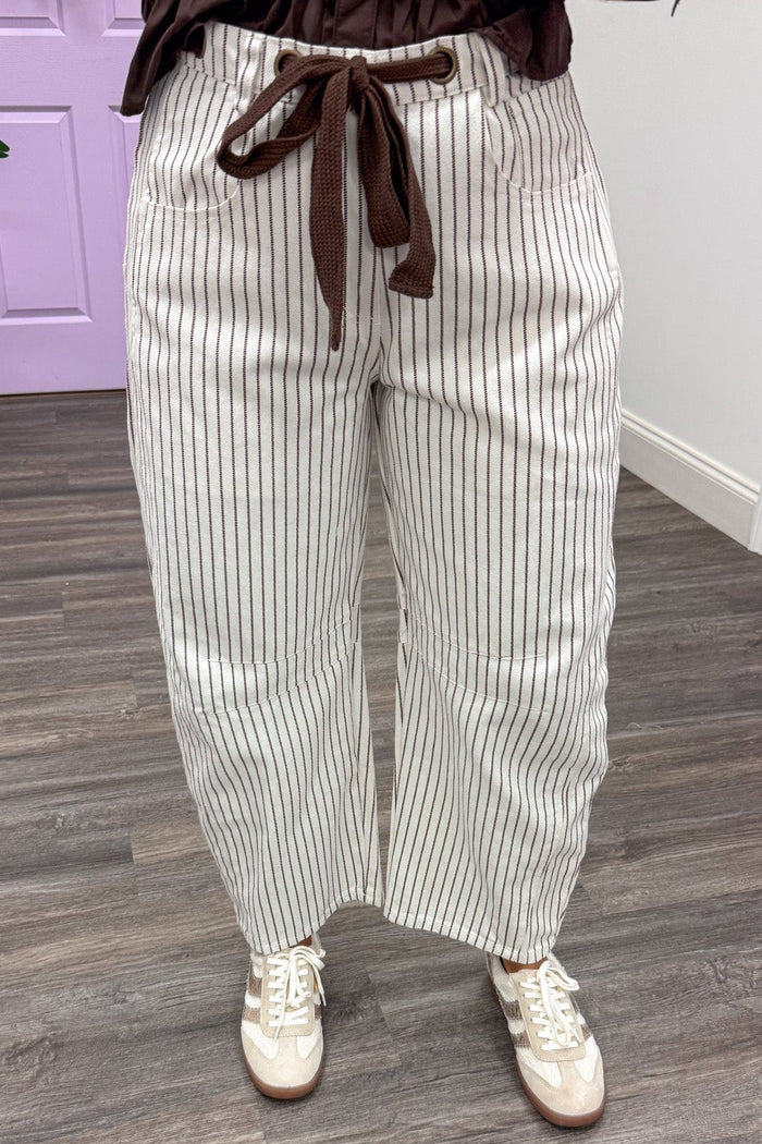 brown and off white striped wide barrel leg denim pants with functional decorative drawstring