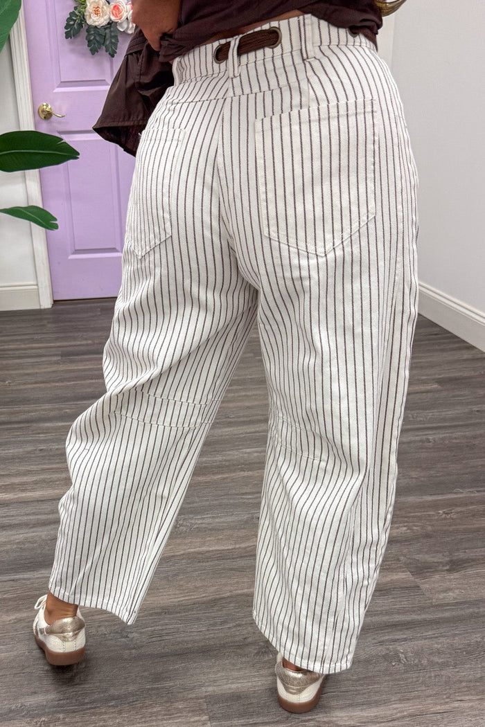 brown and off white striped wide barrel leg denim pants with decorative drawstring and back pockets