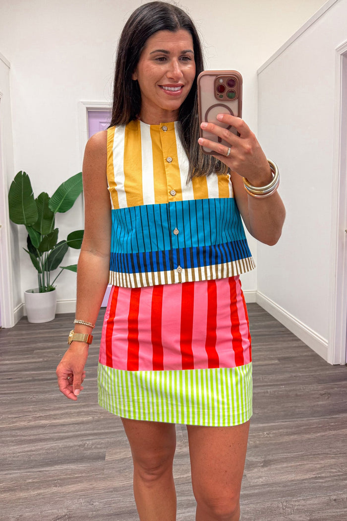 yellow blue teal brown and cream striped button front semi-cropped top