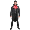 Man dressed as a vampire with long tailed coat, waistcoat, red cravat and jewel