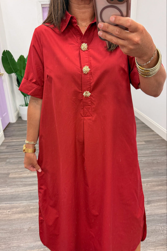 brick red with decorative gold button snap bodice and collared v notch neckline short sleeve midi dress