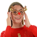 Model wearing Rudolf reindeer novelty glasses with glitter and red pom pom nose for Christmas parties