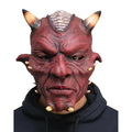 Model wearing a red devil mask with horns and pointed ears for fancy dress costumes