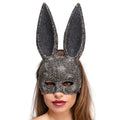 Woman wearing a sparkling rhinestone bunny ears mask for fancy dress parties