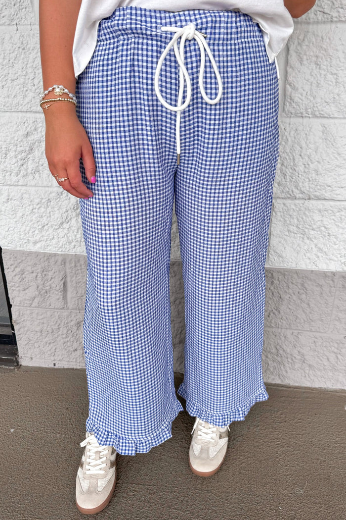 navy blue and ivory gingham checkered print ruffle hem wide leg drawstring pants