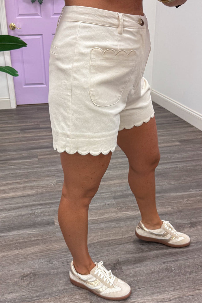 solid ecru wide leg twill shorts with scallop embroidery trimmed pockets and hem