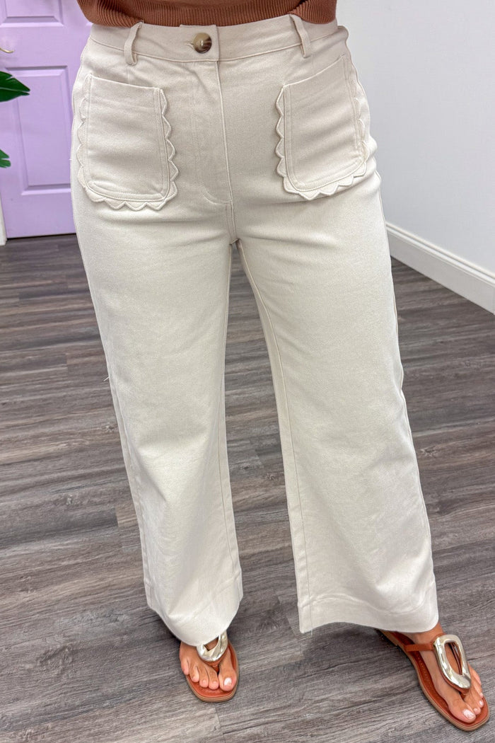 solid ecru wide leg twill denim pants with scallop trim front patch pockets and belt loops