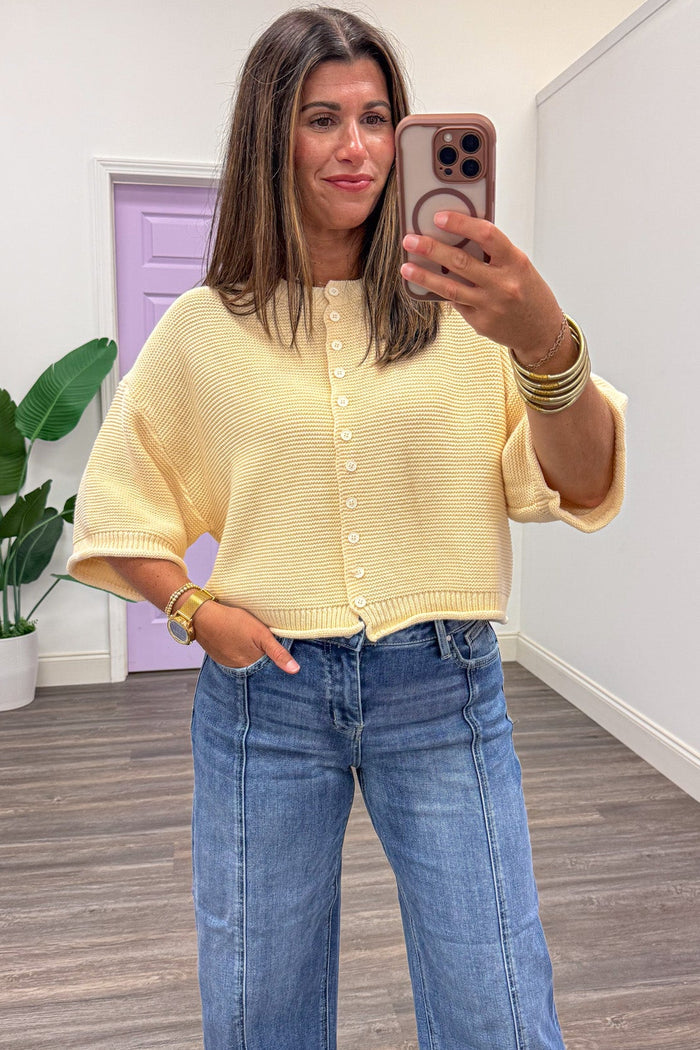 solid butter yellow half sleeve crew neckline button front textured knit cardigan top