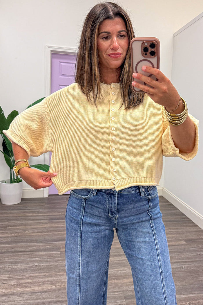 solid butter yellow half sleeve button front relaxed silhouette textured knit cardigan top