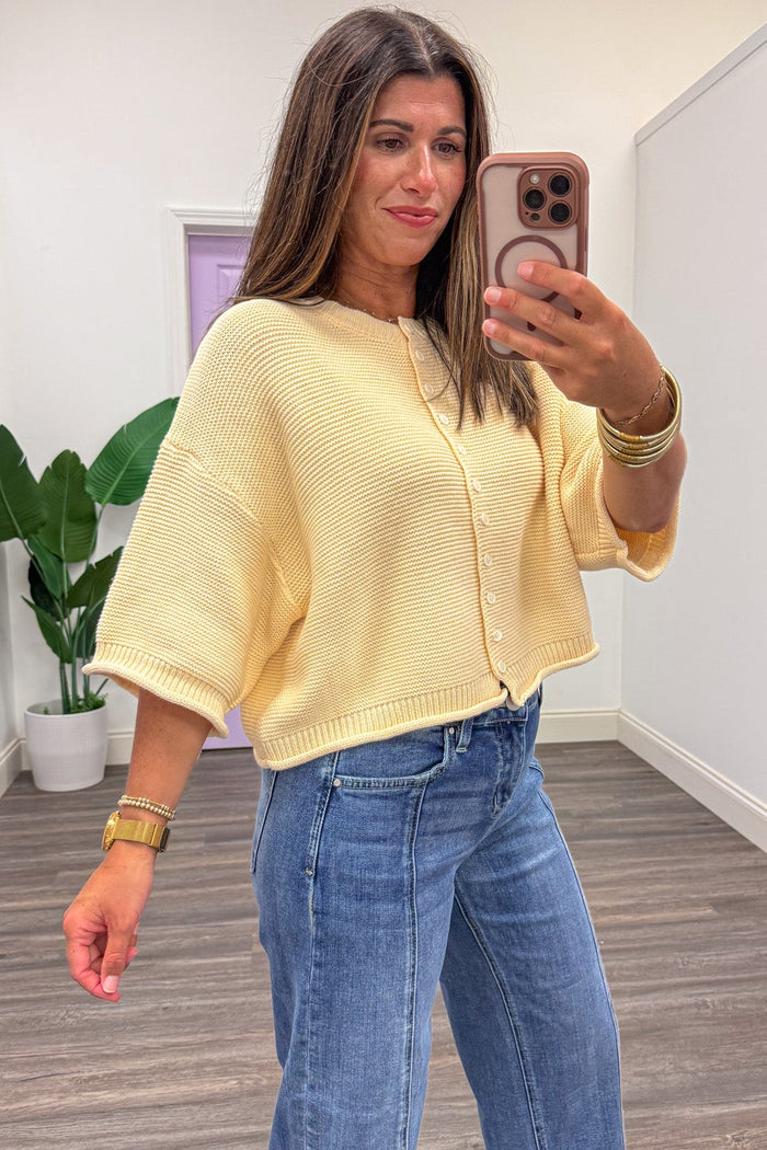 solid butter yellow half sleeve button front textured knit cardigan top with ribbed trim details