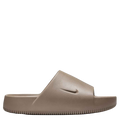 Beige slide sandal with Nike logo on a white background